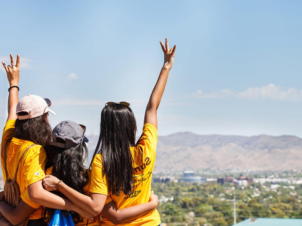 Students on mountain overlooking Tempe, Arizona